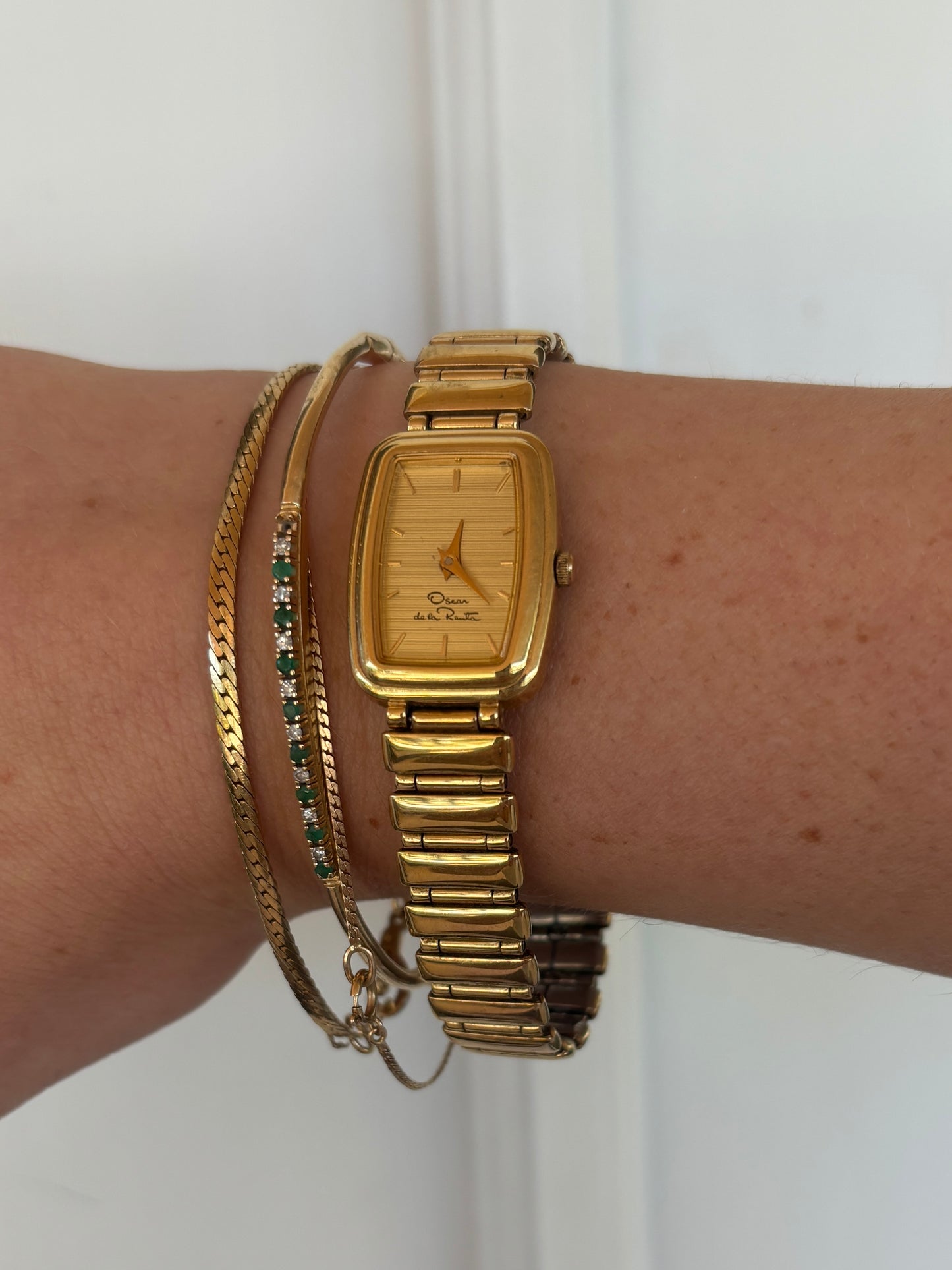 vintage Oscar de la Renta gold watch