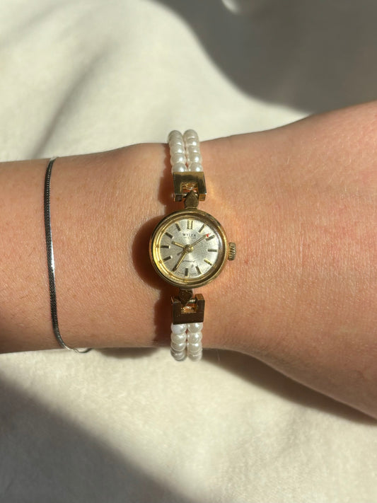 dainty vintage gold wind up watch- working