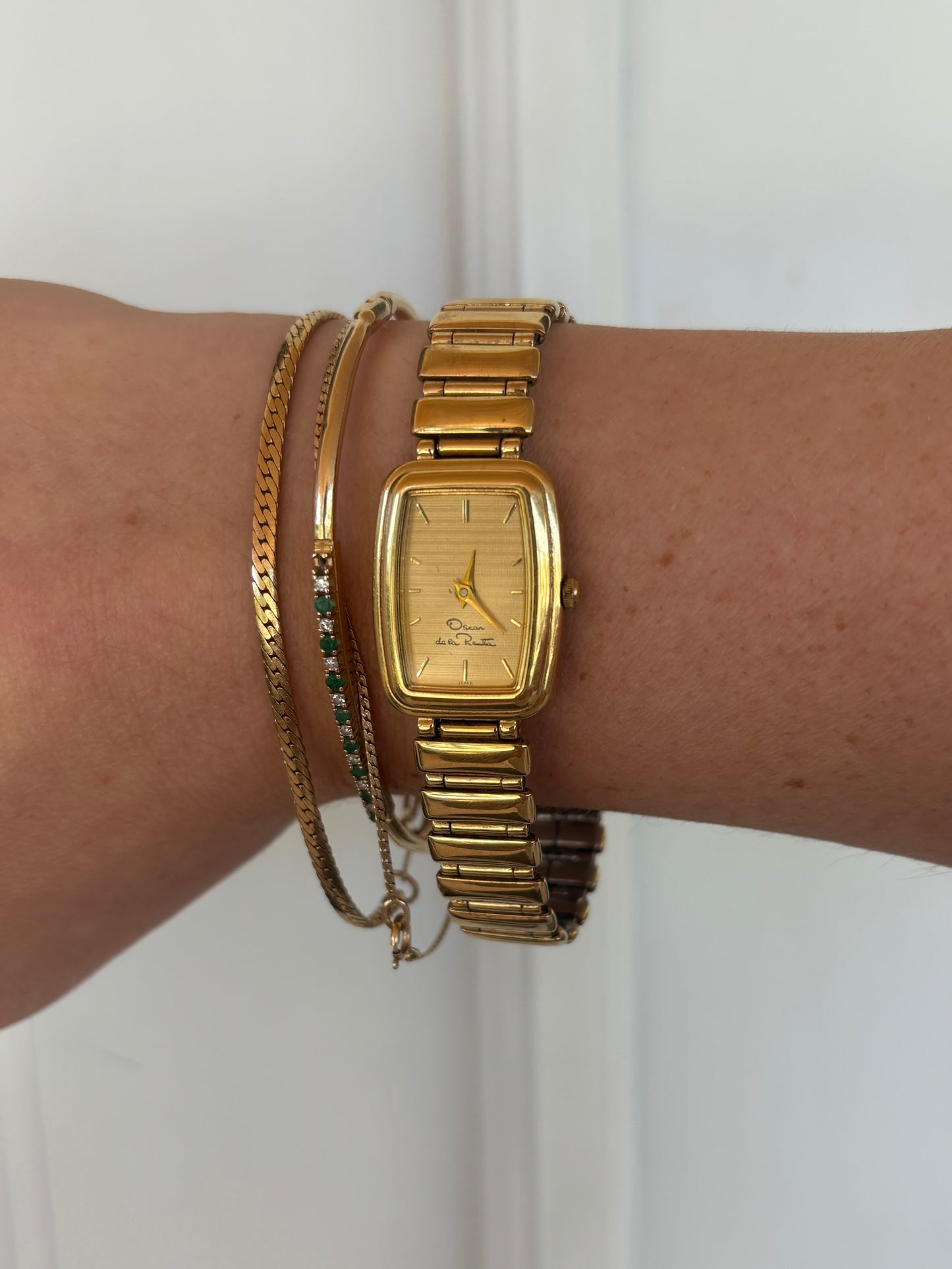 vintage Oscar de la Renta gold watch