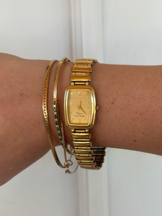 vintage Oscar de la Renta gold watch