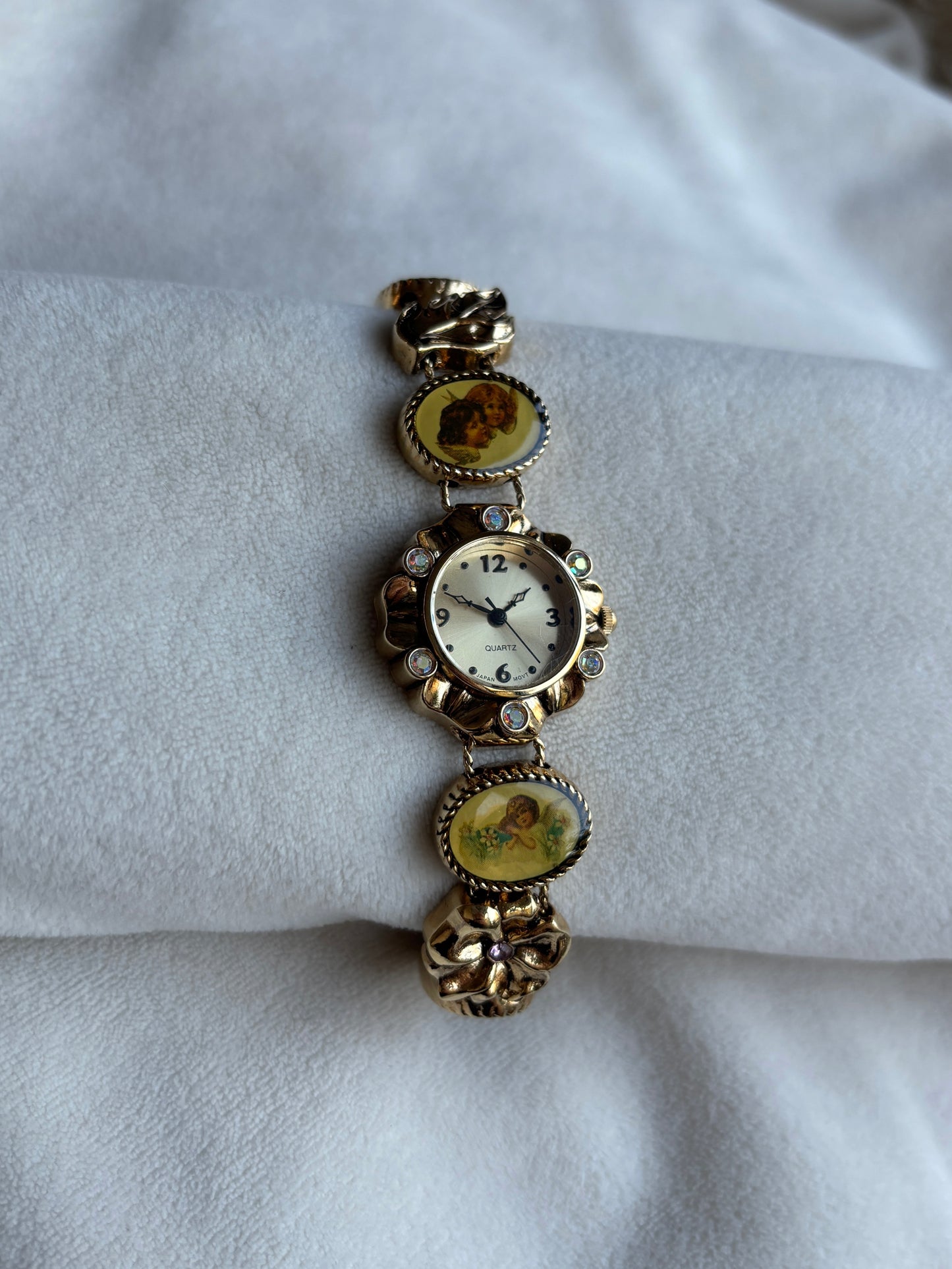 extremely rare gold angel watch - working