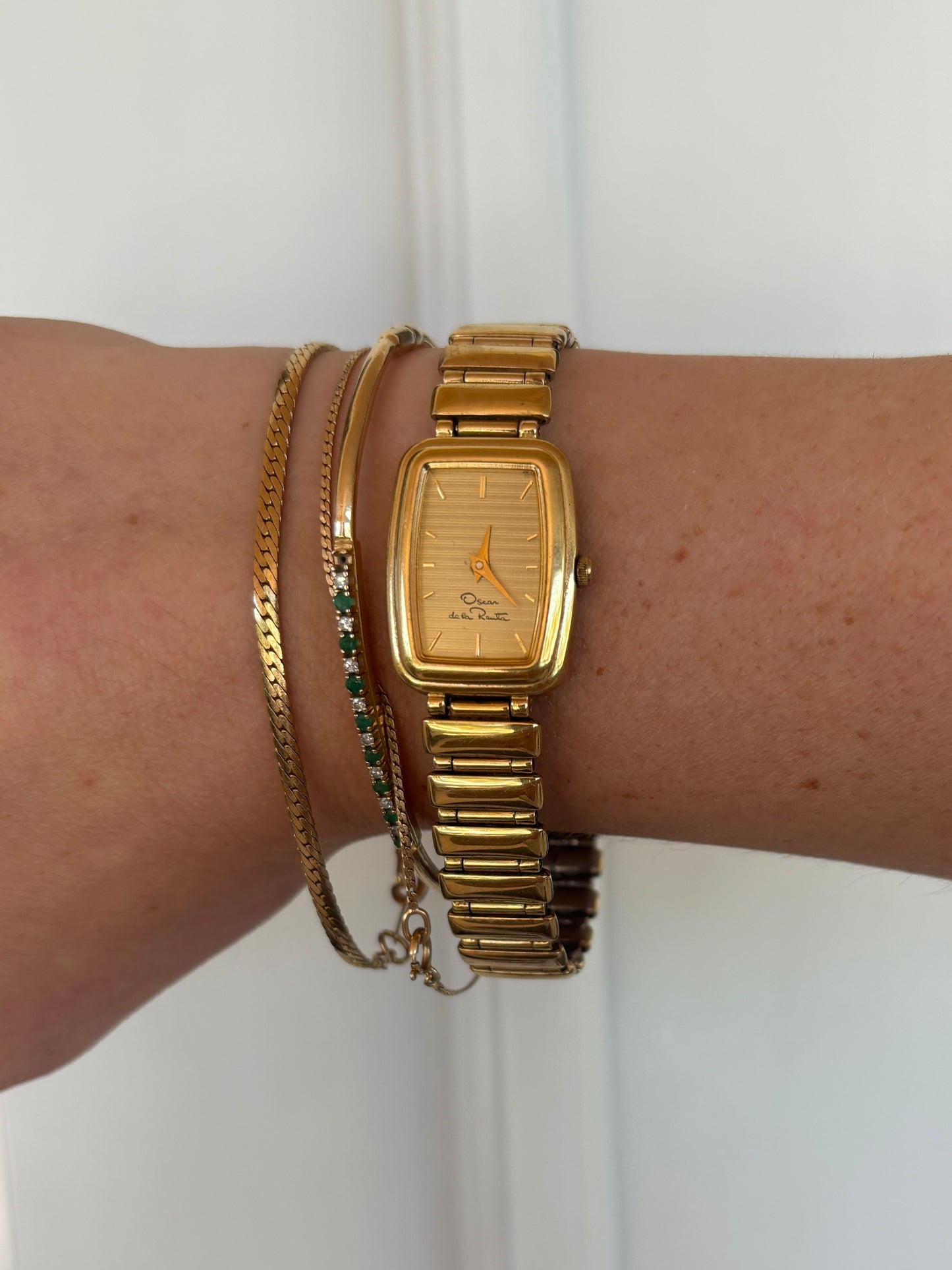 vintage Oscar de la Renta gold watch