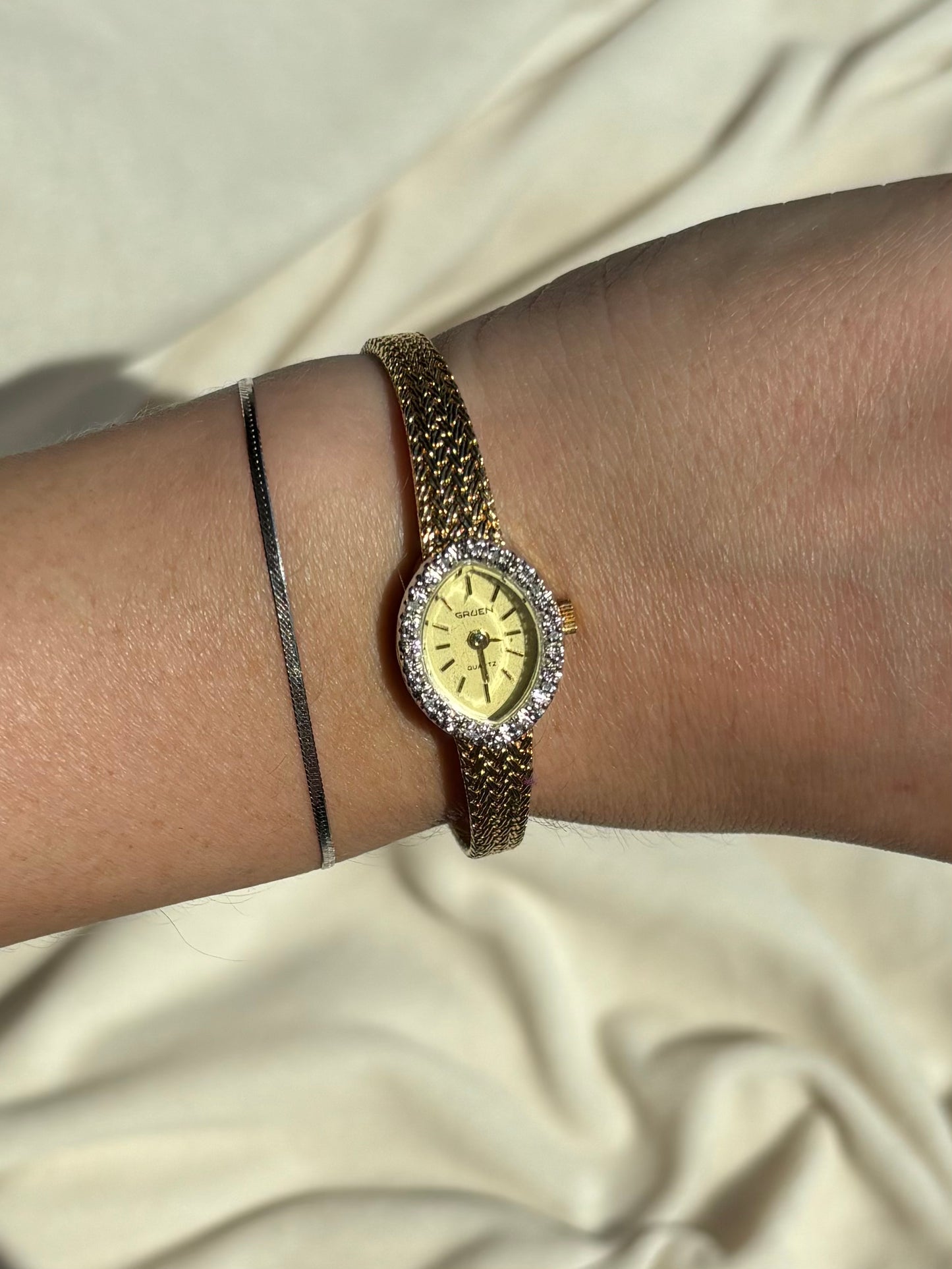 dainty vintage diamond filled bezel watch